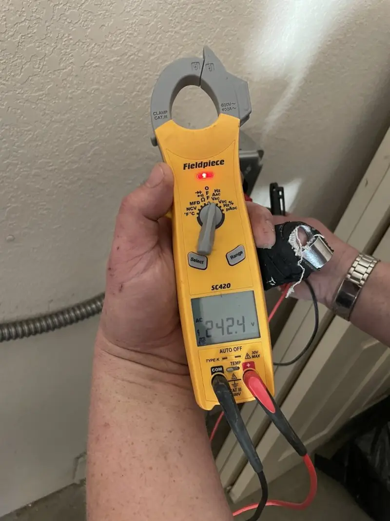 Voltage testing with clamp meter during Generator Installation in Innsbrook
